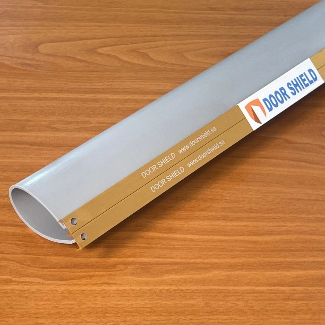 Brown shield and brass curved vise